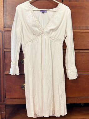 Lace-trimmed white dress